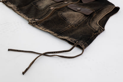 Washed Denim Vest with Leather Details .