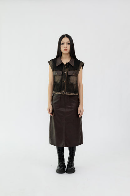 Washed Denim Vest with Leather Details .