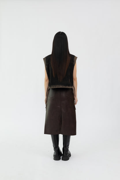 Washed Denim Vest with Leather Details .