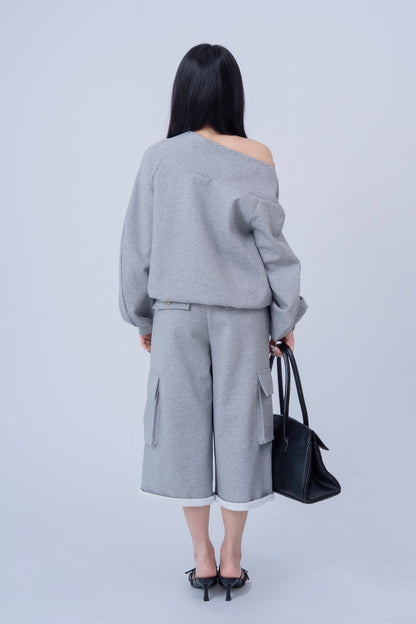 Shoulder Riveted Oversized Long Sleeve Sweater .