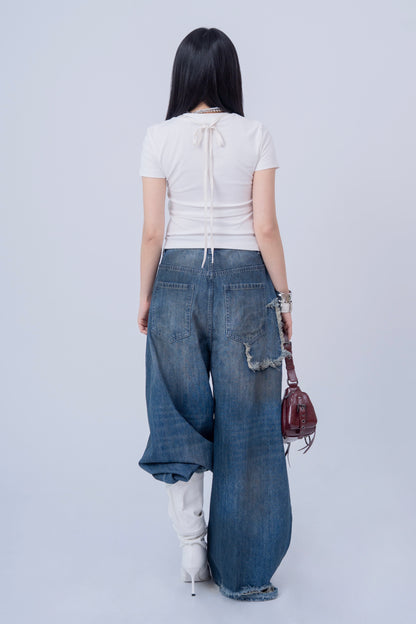 Washed Denim Ripped Baggy Jeans .