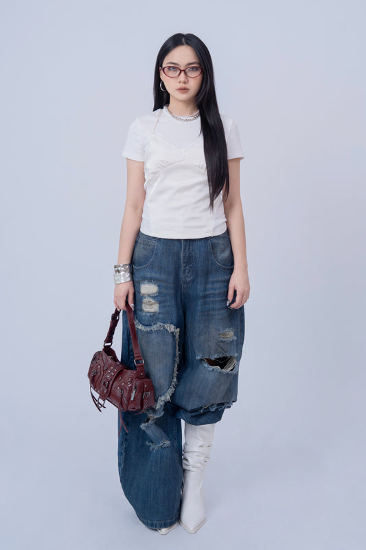 Washed Denim Ripped Baggy Jeans .