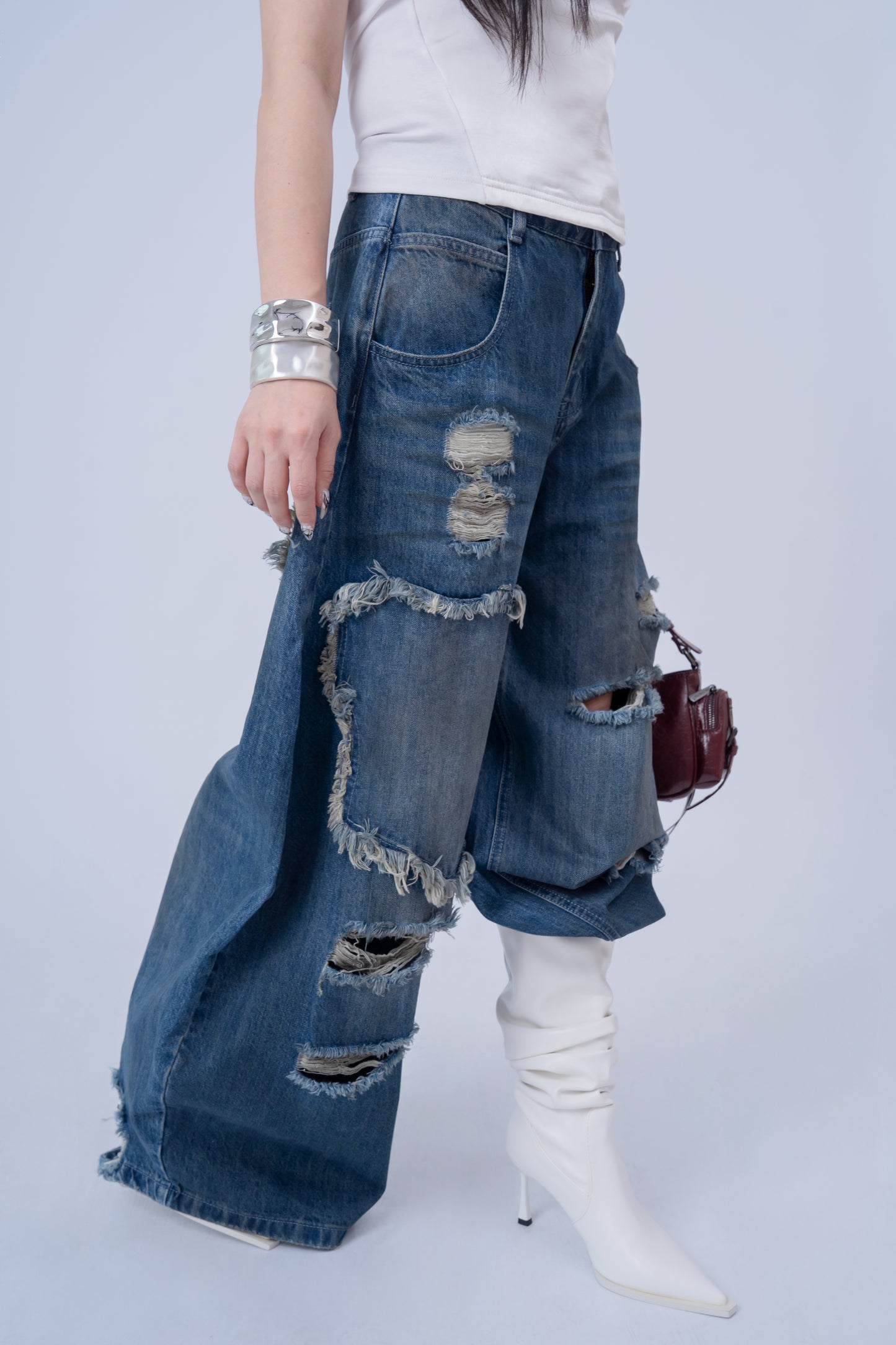 Washed Denim Ripped Baggy Jeans .