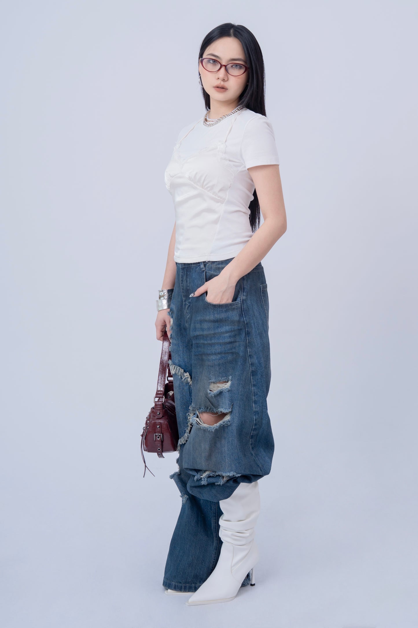 Washed Denim Ripped Baggy Jeans .