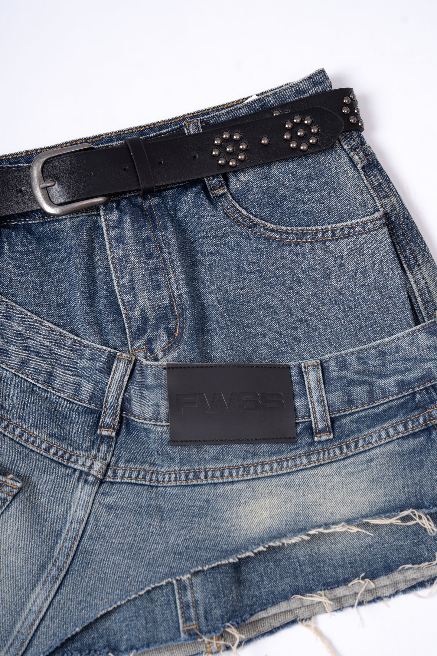 Asymmetrical Offset Seam Mini Skirt .