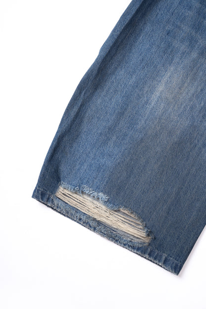 Washed Denim Ripped Baggy Jeans .