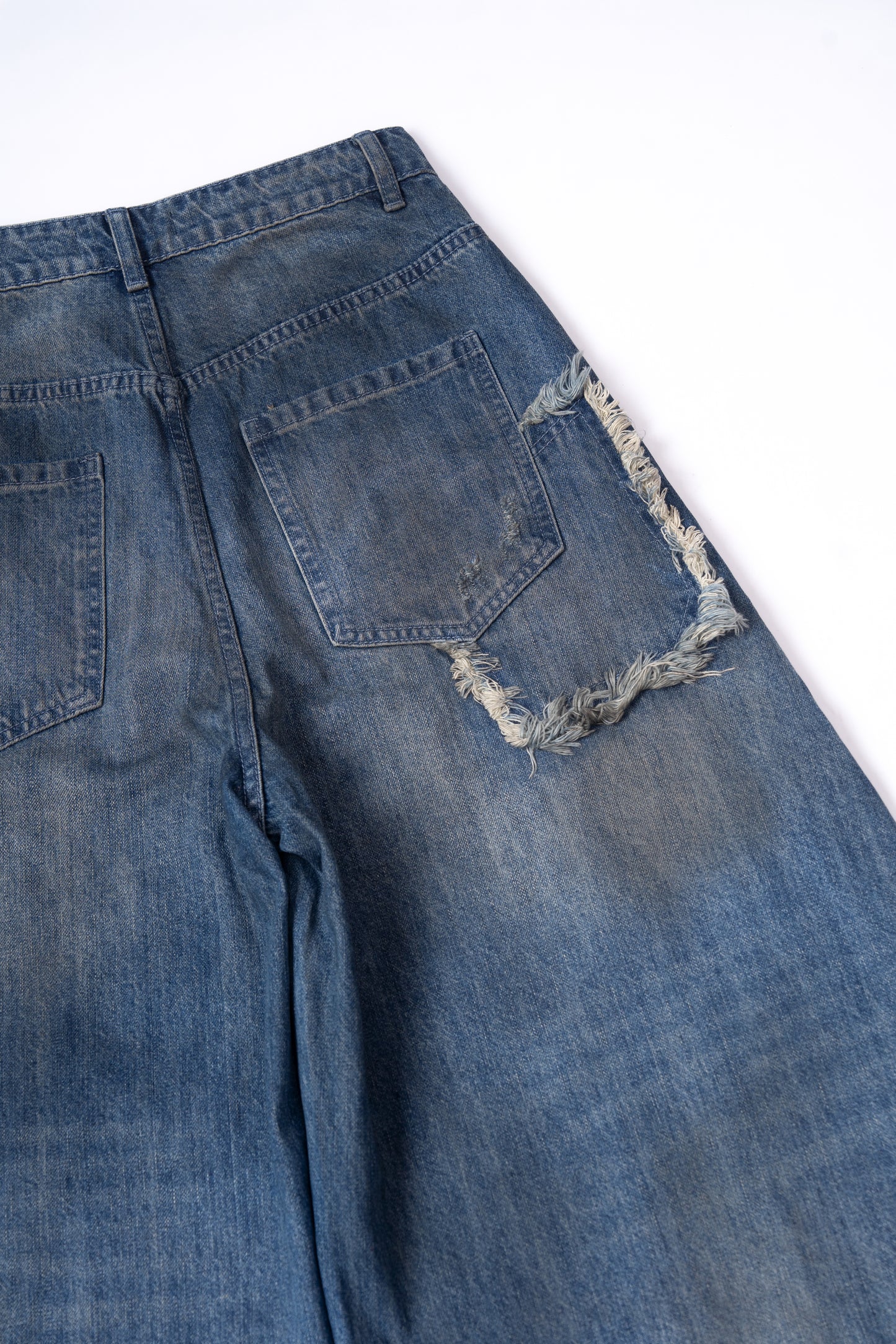 Washed Denim Ripped Baggy Jeans .