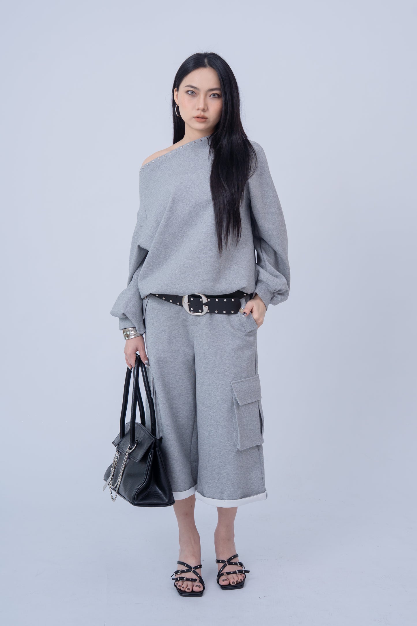 Shoulder Riveted Oversized Long Sleeve Sweater .
