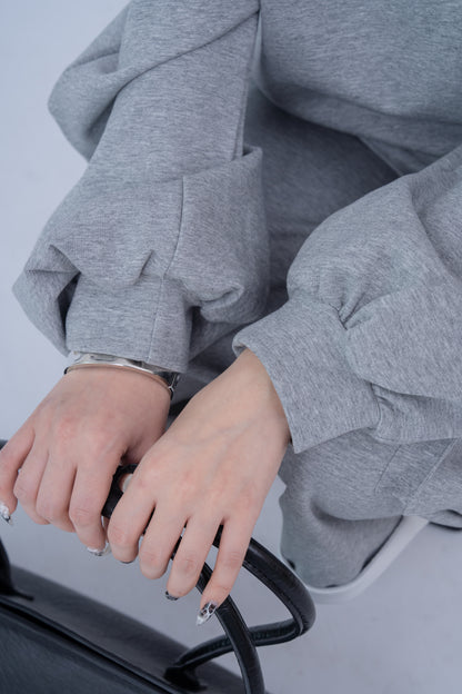 Shoulder Riveted Oversized Long Sleeve Sweater .