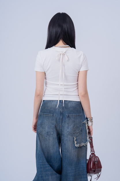 Washed Denim Ripped Baggy Jeans .