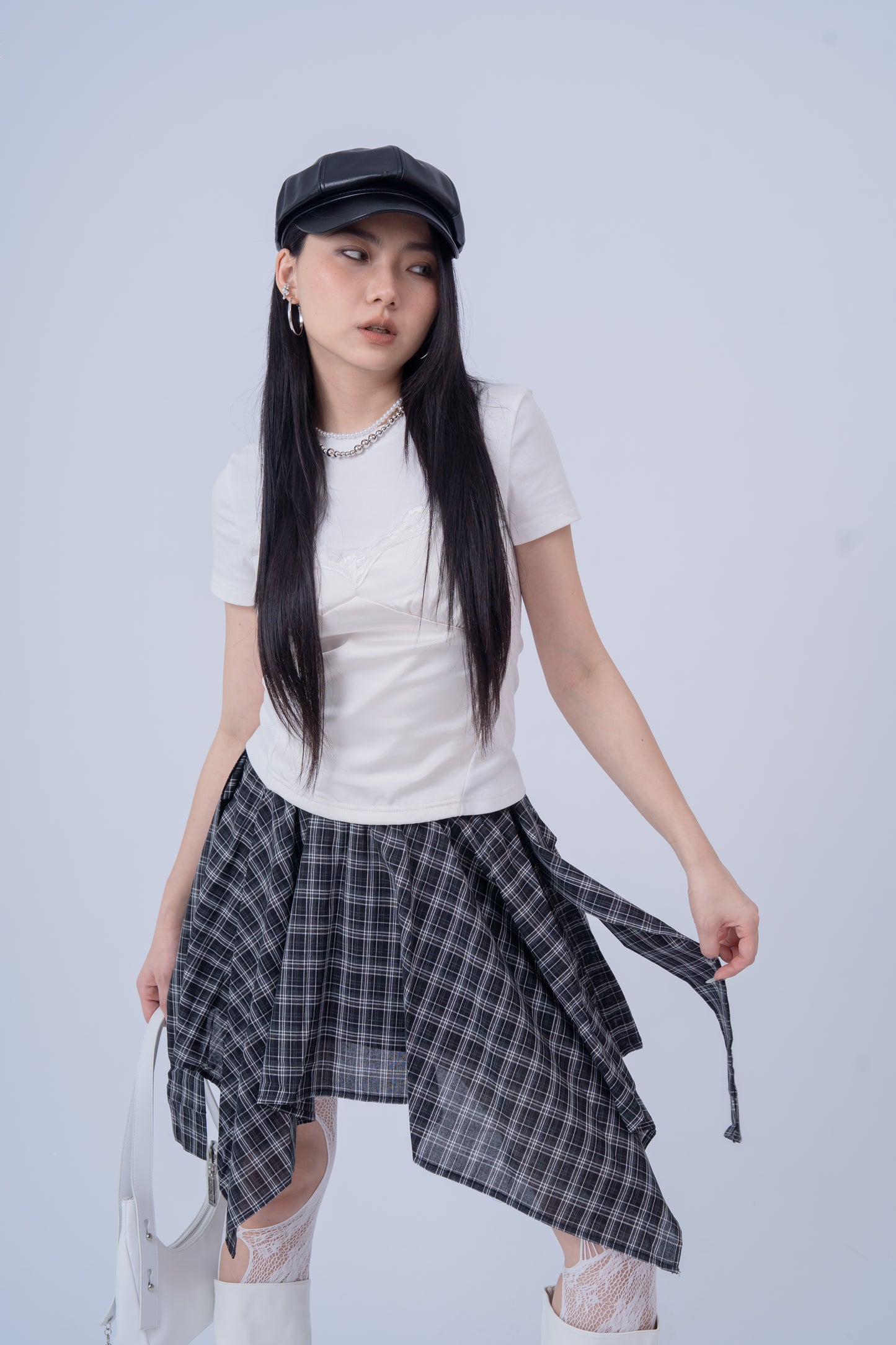 Irregular-Patterned Plaid Skirt .