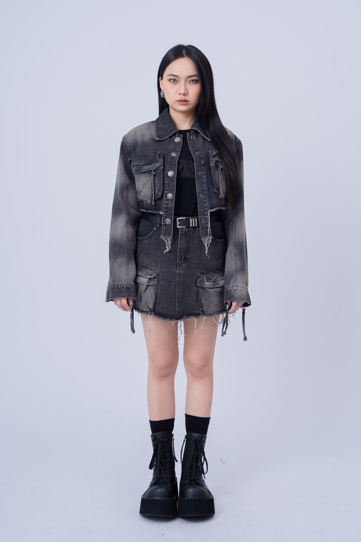 Washed Denim Skirt with Multi Pockets .