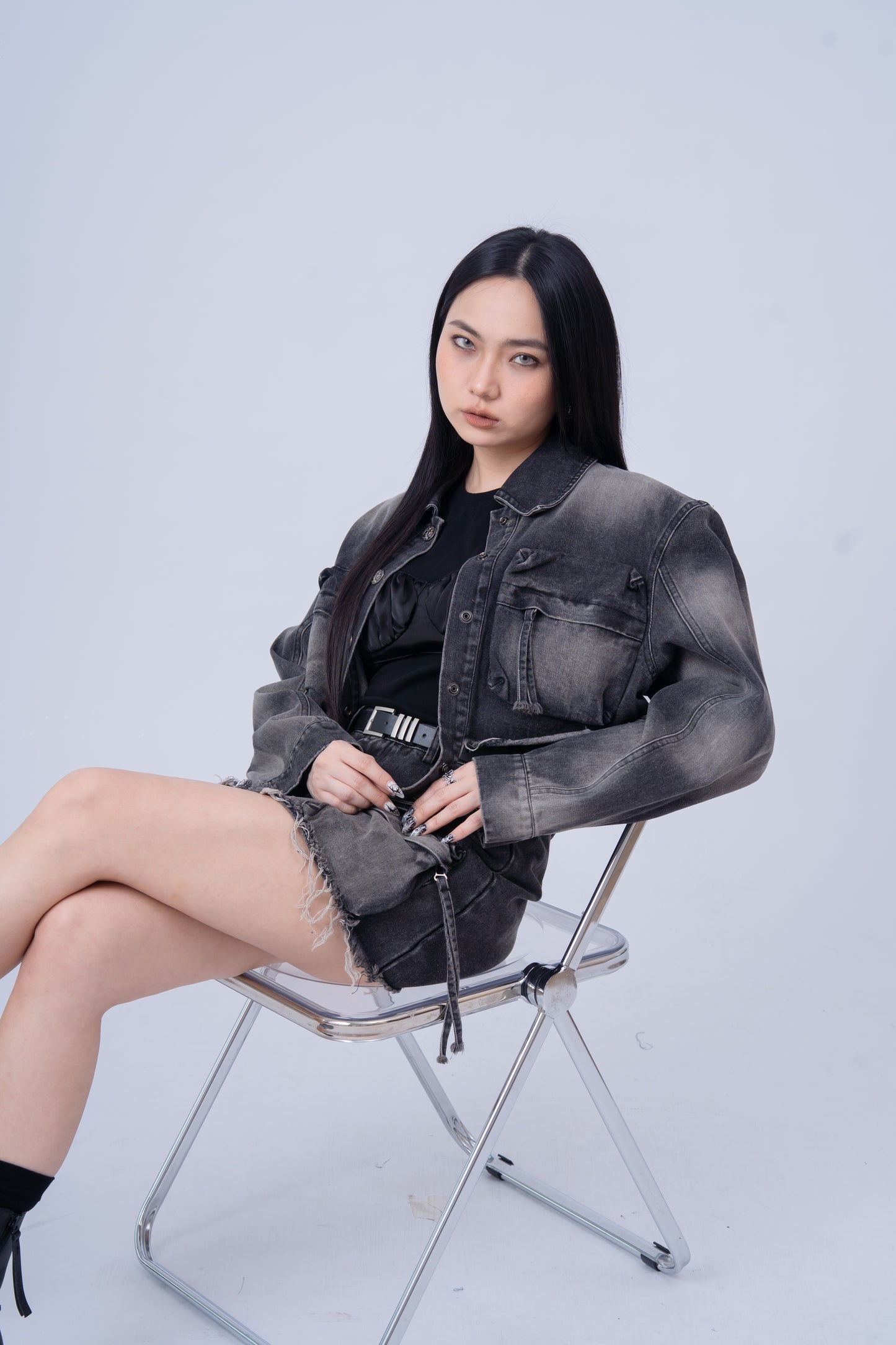 Washed Denim Jacket with Multi Pockets .